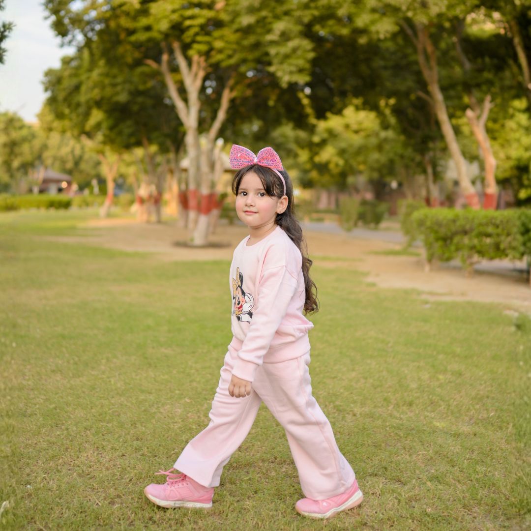 Baby Pink Minnie Mouse Drop Shoulder Track Suit - side view walking